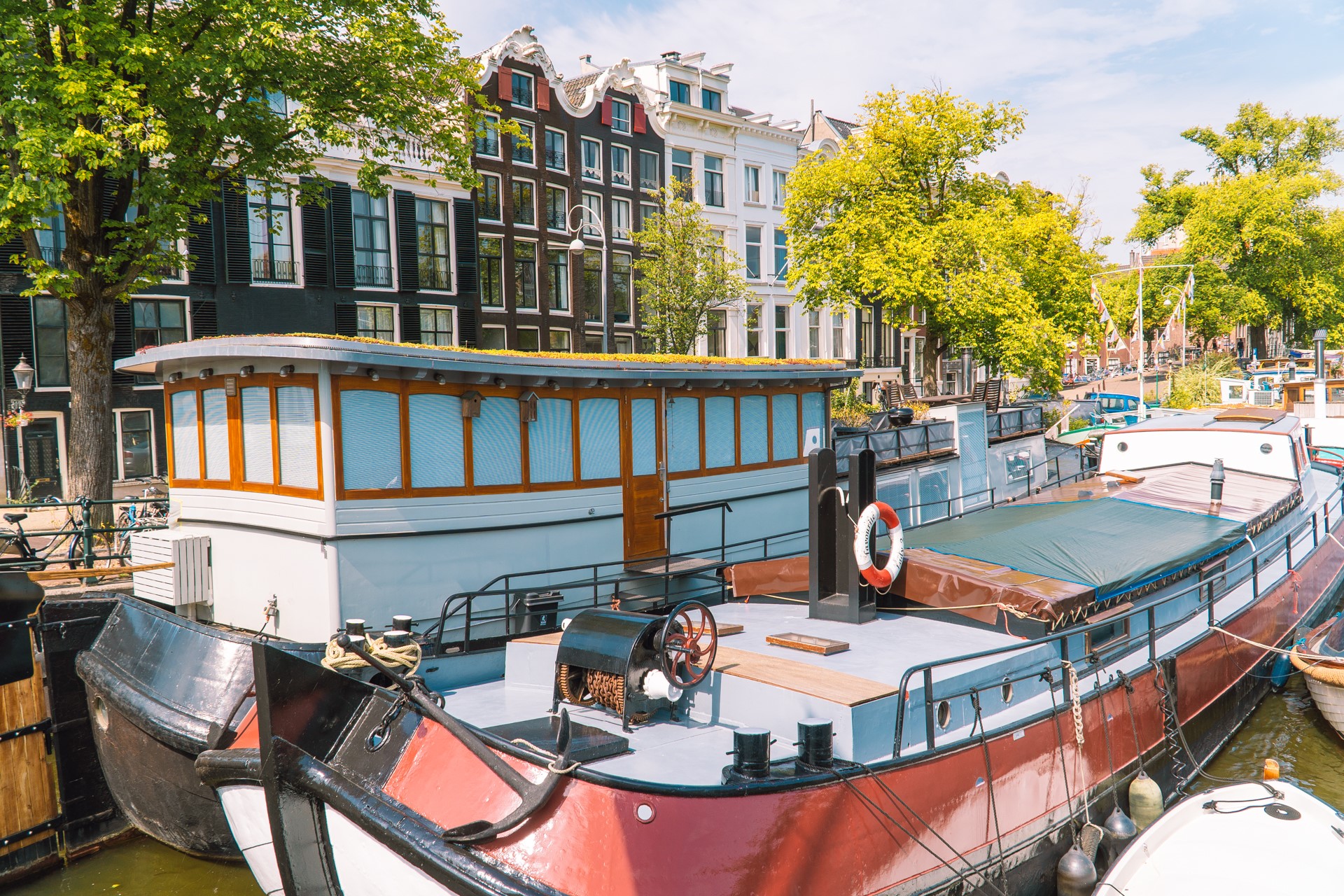 Łodzie mieszkalne w kanałach w Amsterdamie | Weekend w Amsterdamie